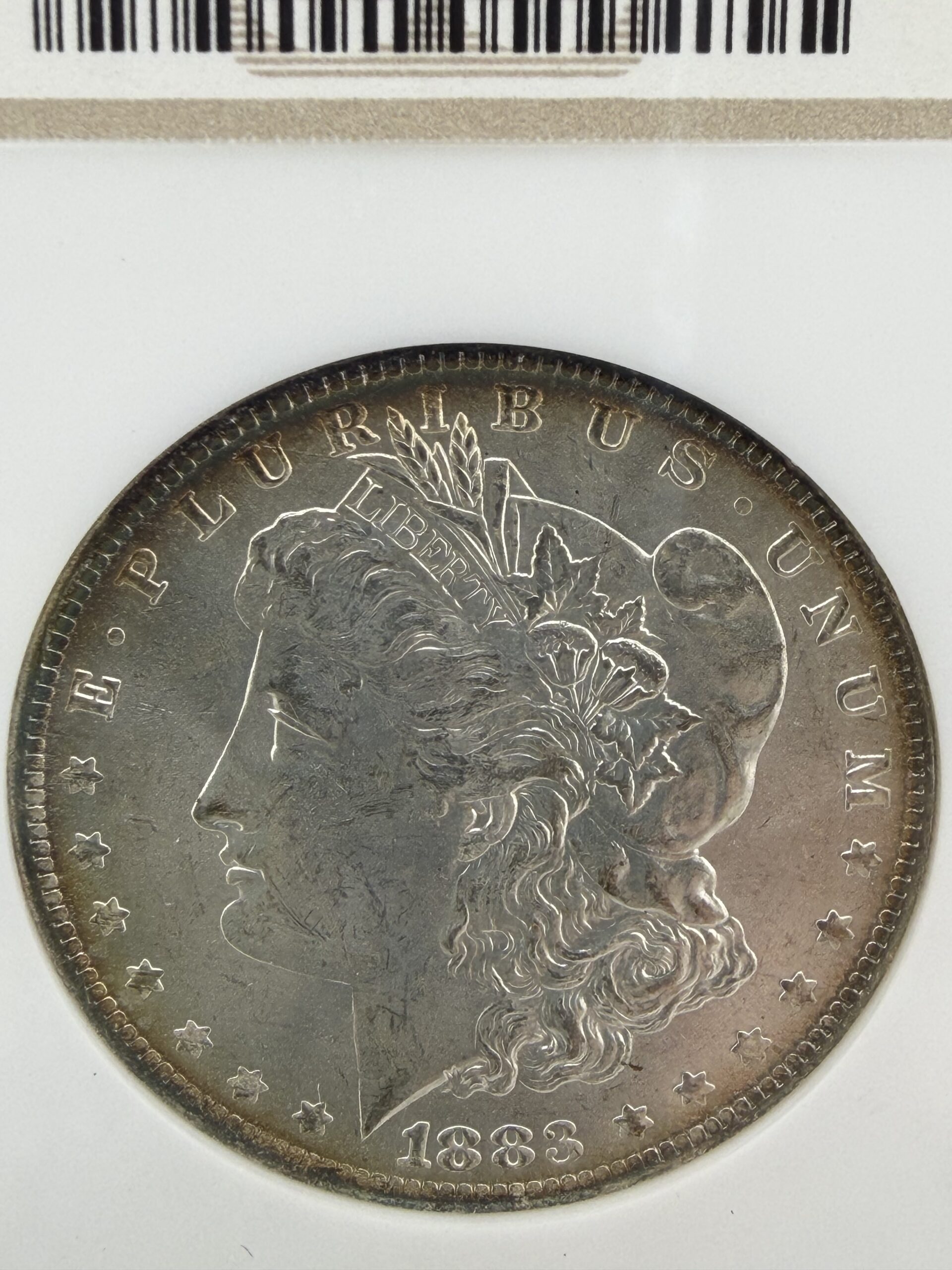 1883-O Morgan Silver Dollar NGC MS63 – Attractive Toning - Image 2